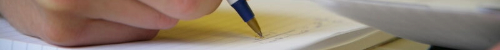 close-up of pen writing on paper
